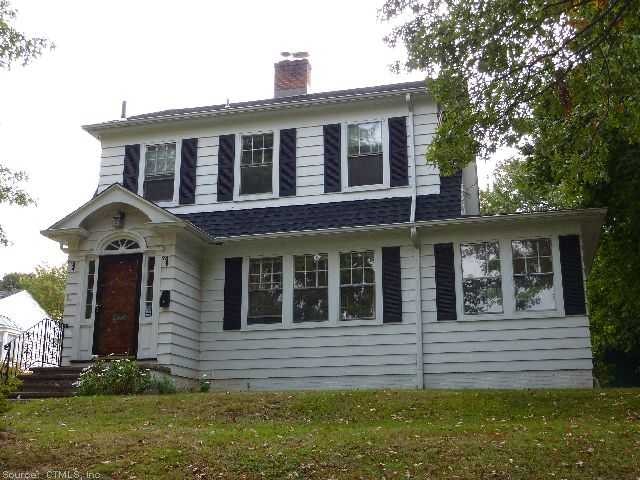 Exterior Front. From the Front, The Warm Red Door 