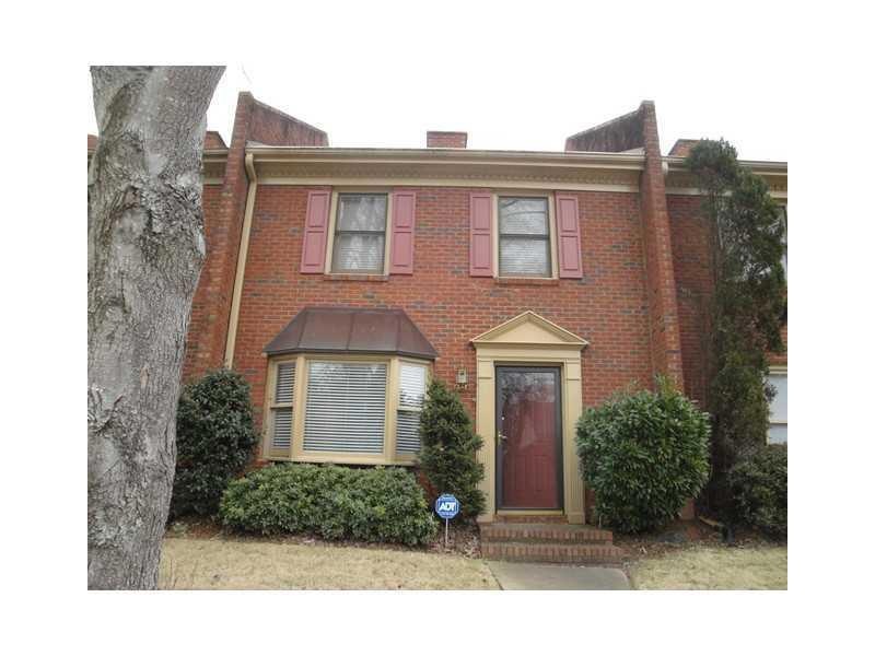 Exterior Front. Awesome brick townhome in great Tu