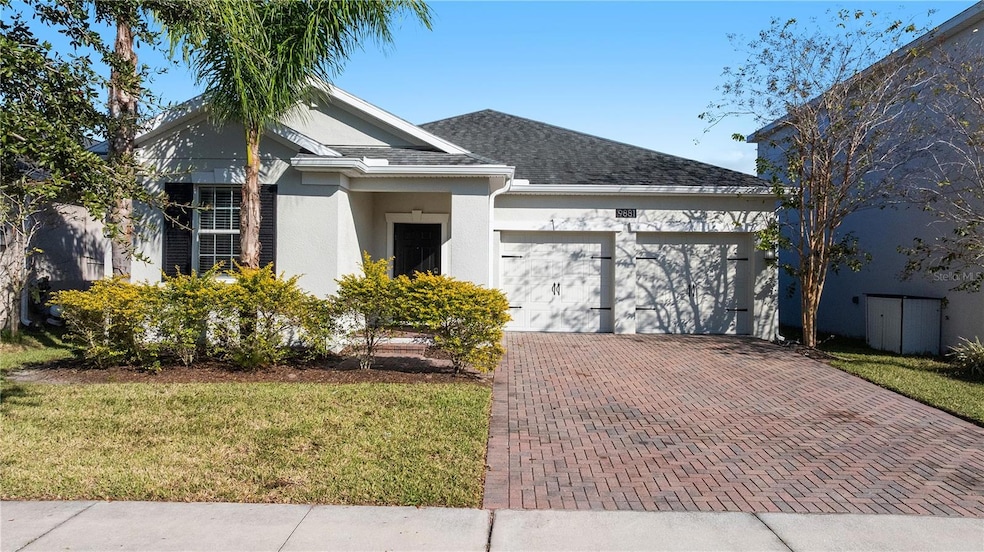 9881 Magnolia Woods Blvd, Orlando, FL 32832 - photo 1