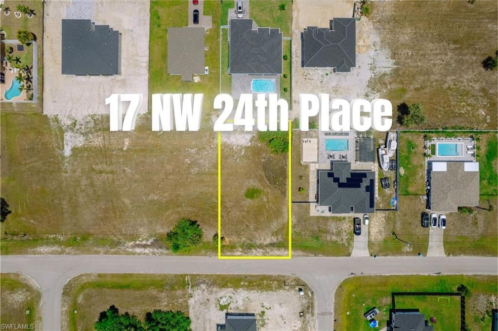 Aerial view of property and surrounding area with 