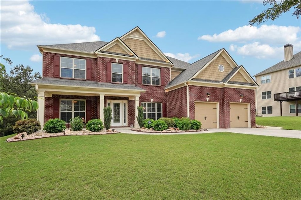 View of front of home featuring an attached garage