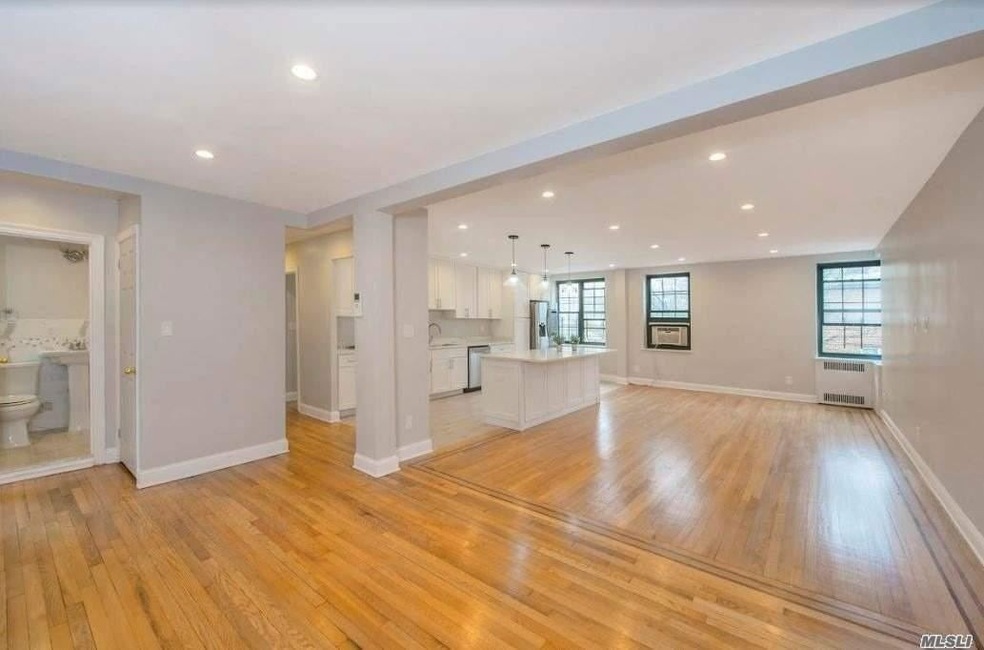 94-11 69th Ave unit 203, Forest Hills, NY 11375 - photo 1