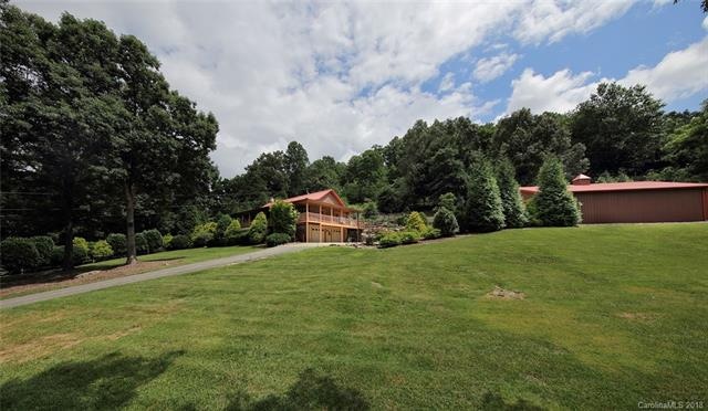 Log home and workshop on 1.47 manicured acres