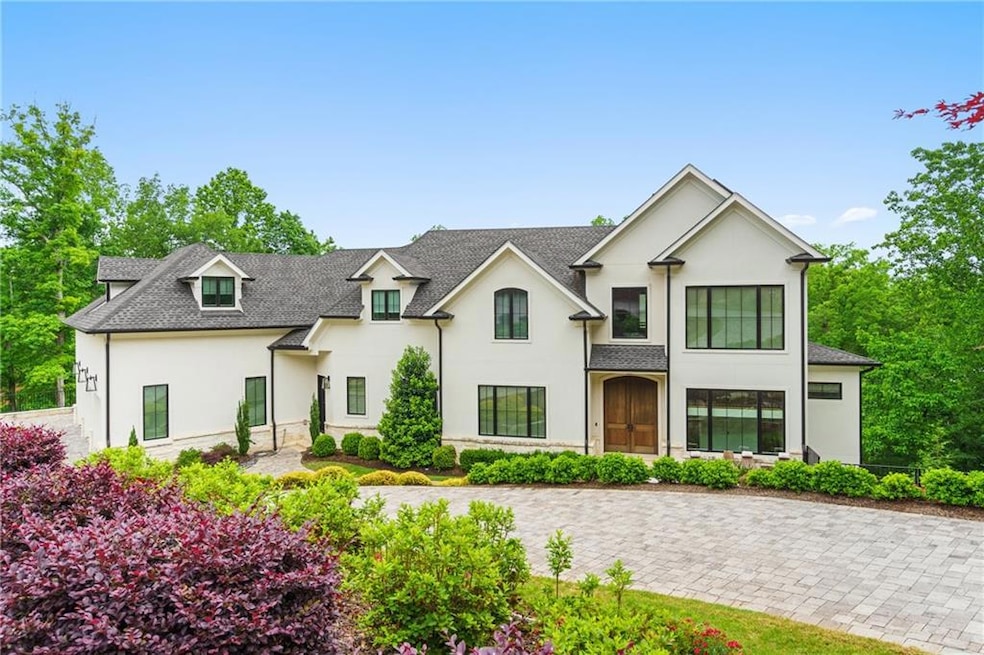 View of front of property featuring stucco siding 