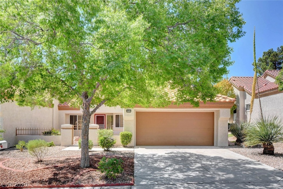 Large tree shades front of home