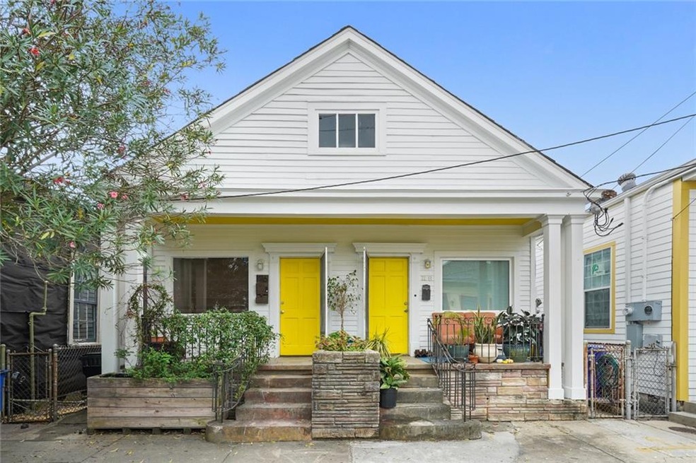 Freshly painted exterior with great porch on frien