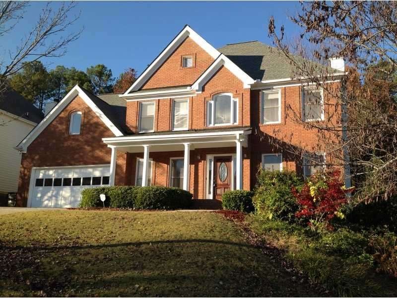 Exterior Front. Brick & Hardiplank traditional hom