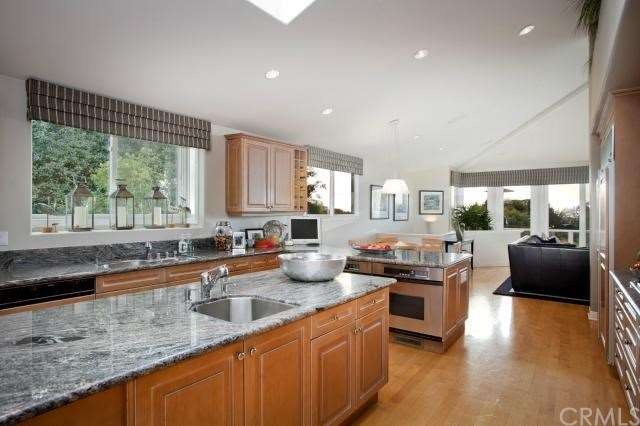 Gorgeous kitchen with granite counters. 