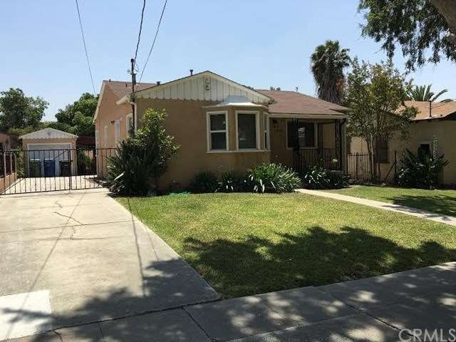 FRONT PHOTO WITH CONCRETE SLAB DRIVEWAY