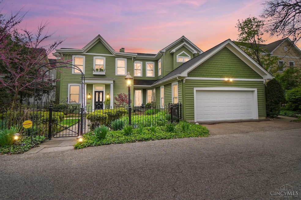 Priceless 9-mile river view oasis! This superb 4BR, 4+1BA circa 1885 home perfectly situated on prized Columbia Parkway Lane. Boasting 4,000 SF of upscale yet comfortable living space w/first rate renovations and the character of its time well preserved, this home offers magnificent panoramic up + down river views from nearly every room. Key features incl 11 ft ceilings, original plaster moldings + millwork and gleaming hardwood flrs. The gourmet eat-in KIT is open to a bright + welcoming family room w/wet bar + fireplace. The great room, an elegant formal dining room w/built-in silver cabinet, guest quarters w/ensuite bath, a laundry room and powder room round out the 1st flr. The 2nd flr is comprised of 3 spacious ensuite BRs, including the expansive primary suite, an office and walkout access to a river view balcony. Partially finished LL w/wine cellar. Attached 2-car GAR + off street parking. Slate terrace overlooks verdant manicured rear yard. Urban living at it's finest.