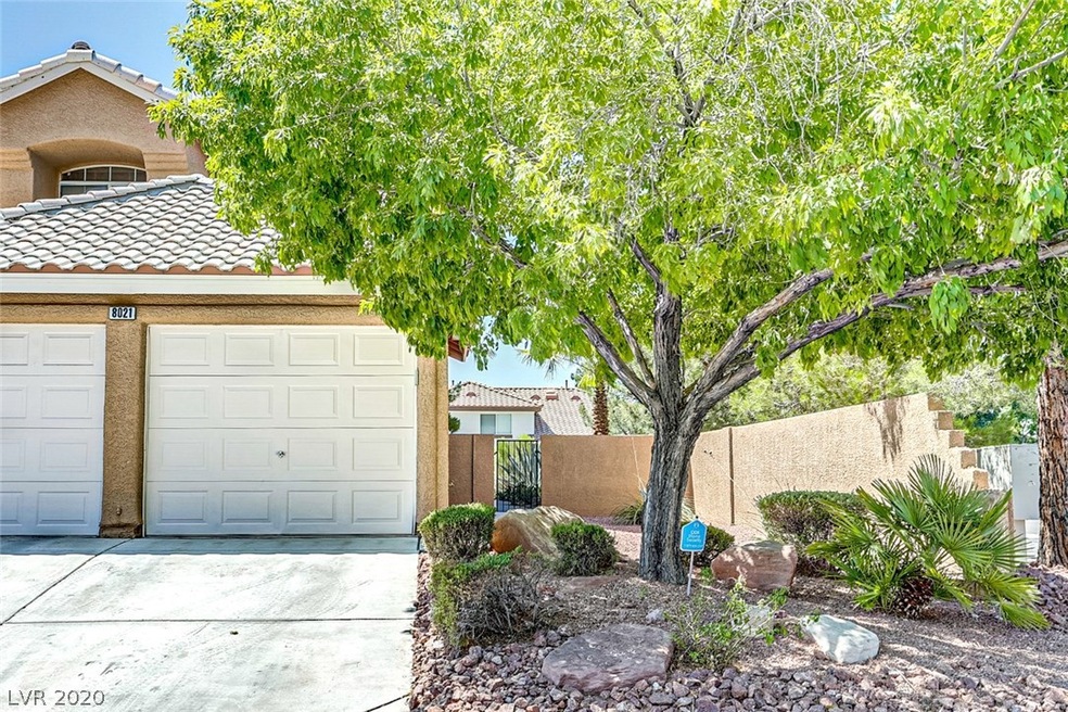 Exterior Front with desert landscaping and large s
