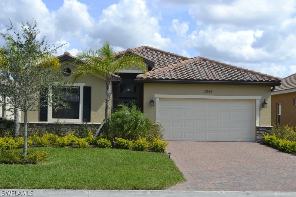 Beautifully landscaped entrance to home