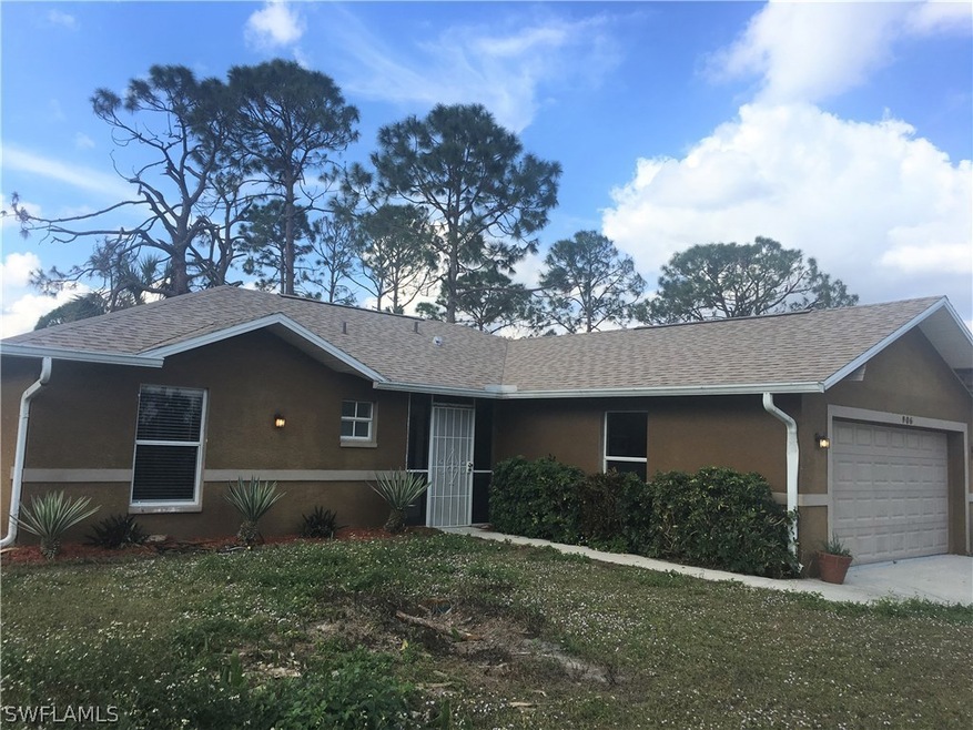 906 Naples Ave S, Lehigh Acres, FL 33974 - photo 1