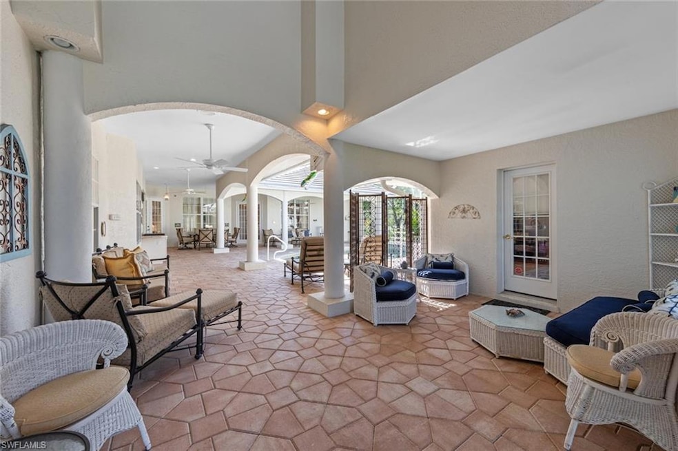 View of patio with a ceiling fan