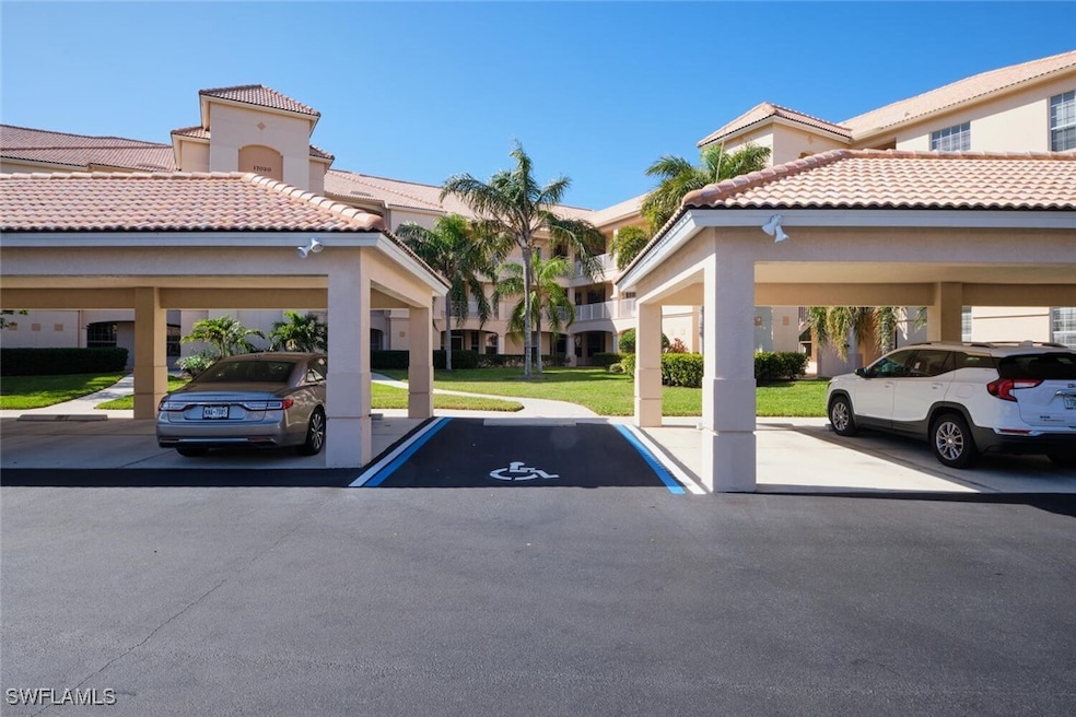 View of parking / parking lot with a carport and a