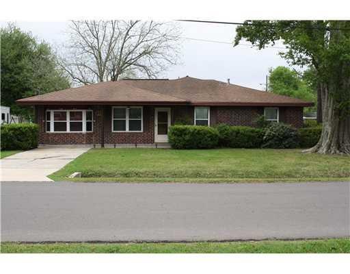 Photo. House sits on a corner lot