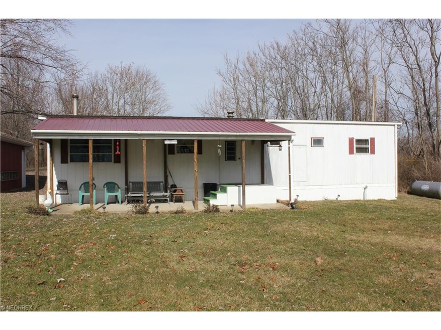 Front of home. Large covered from Porch