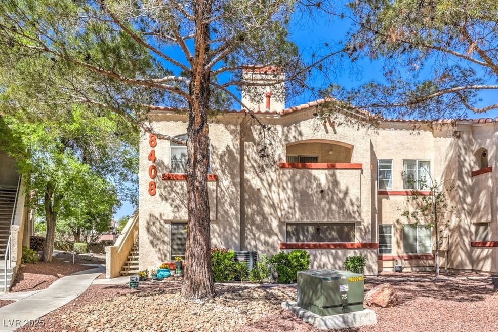 View of front of home featuring stairway and stucc