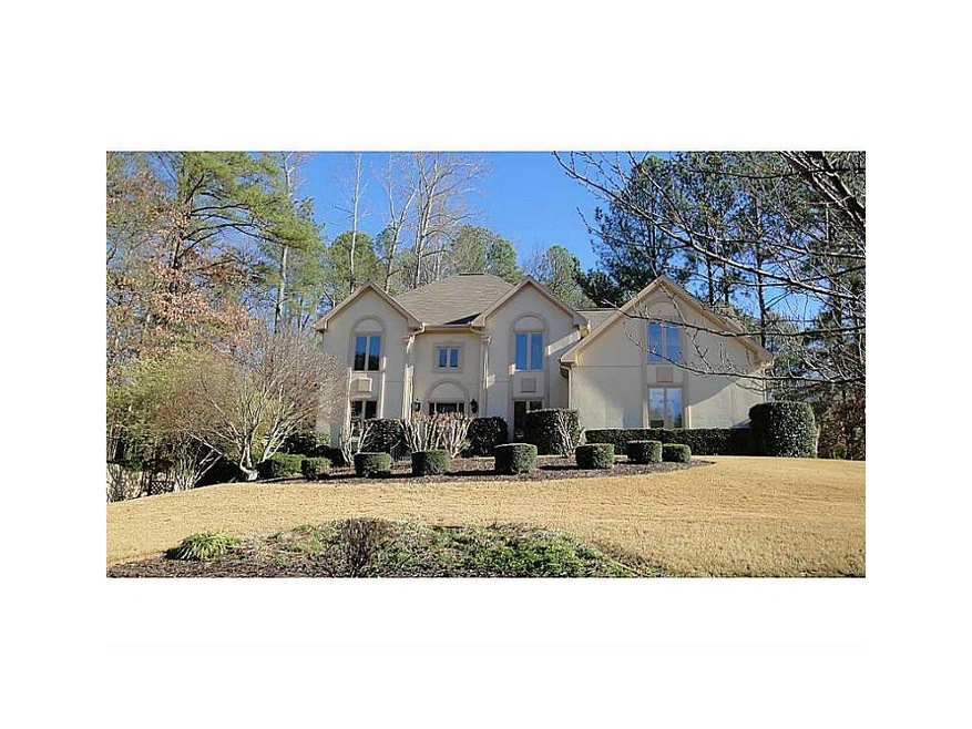 Exterior Front. Over-sized corner lot with beautif