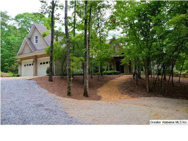 Quality construction nestled on 26+ acres.