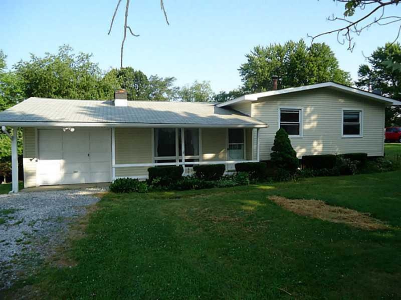 Exterior Front. New vinyl siding and roof