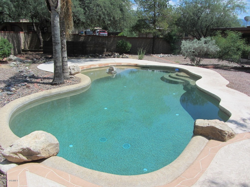 huge Pebble tec pool and gazebo