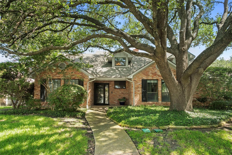 6143 White Rose Trail. Beautiful tudor inspired tr