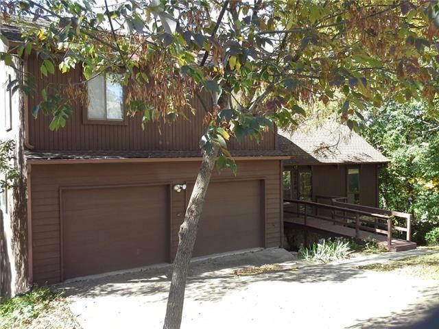 Beautifully wooded lot in lake community offers un