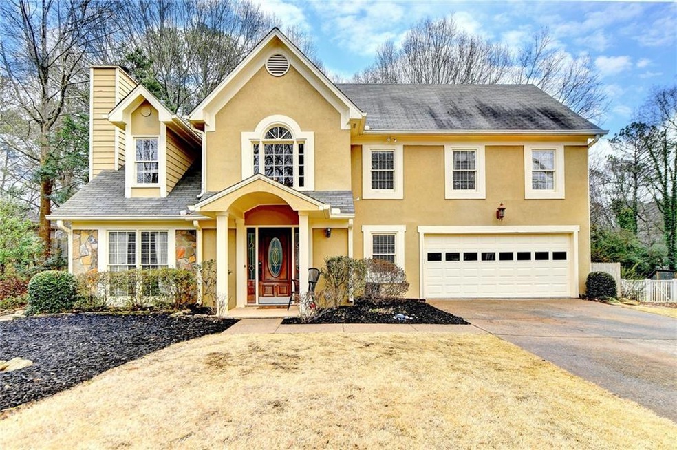 Front of property featuring a garage