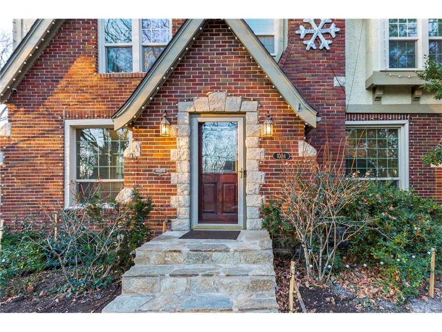 Stunning brick and stone greet you at this beautif