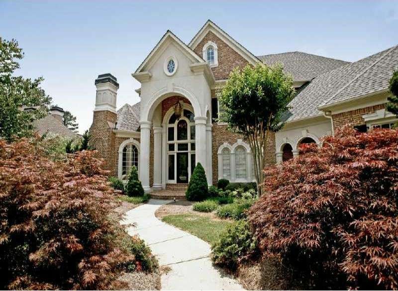 Exterior Front. Stately & impressive brick home wi