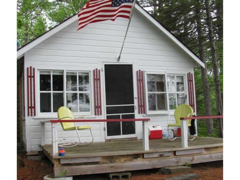 Exterior Front. Rustic Island...