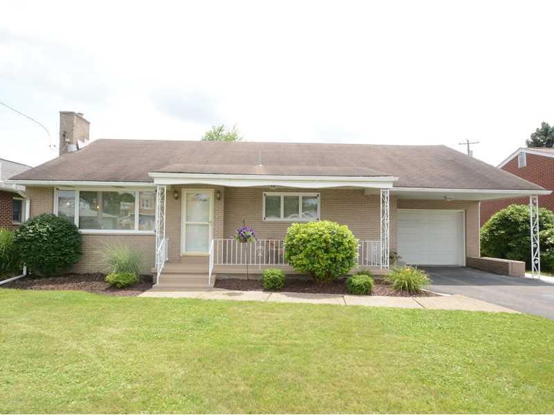Exterior Front. Three-bedroom, two-bath brick ranc