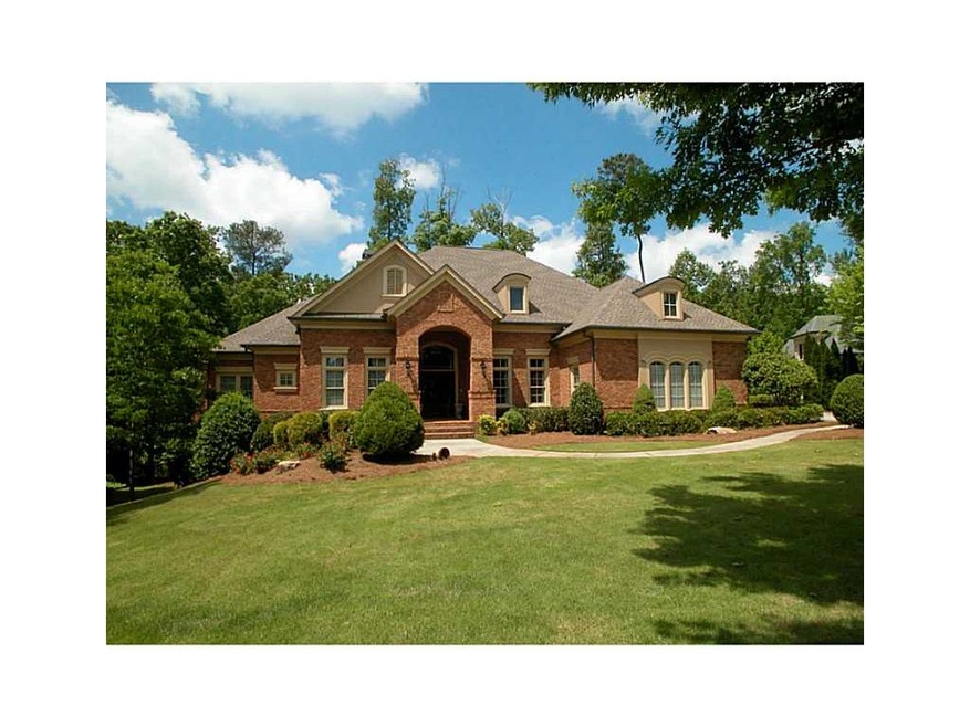 Facade/Exterior Front. Lovely brick home on large 