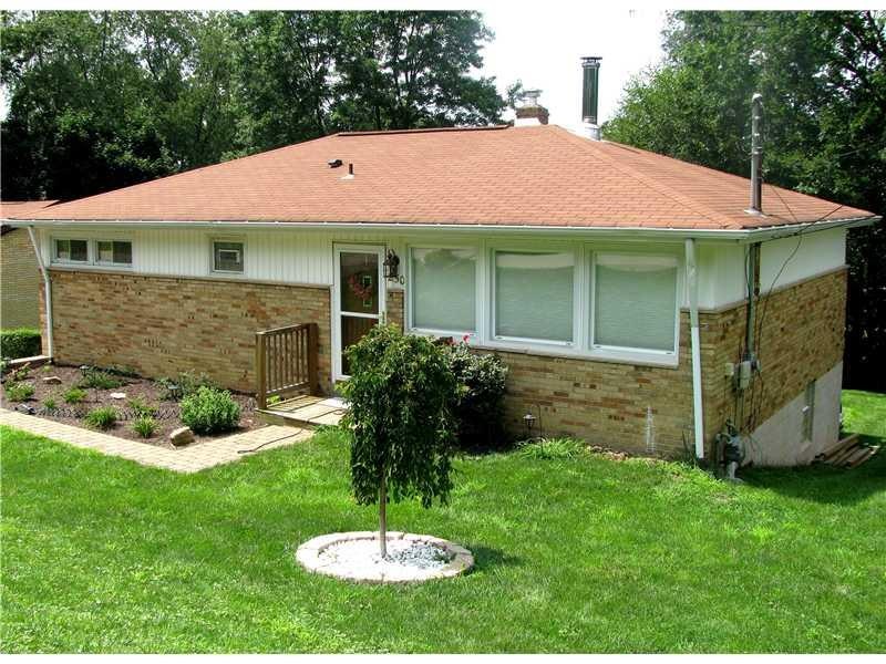 Exterior Front. Brick & Aluminum ranch home, w/ mu