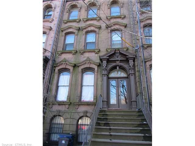 Exterior Front. 1865 On-the-Park; Wooster St behin