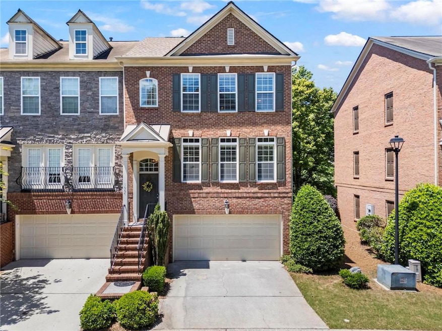 Townhome / multi-family property with a garage, co