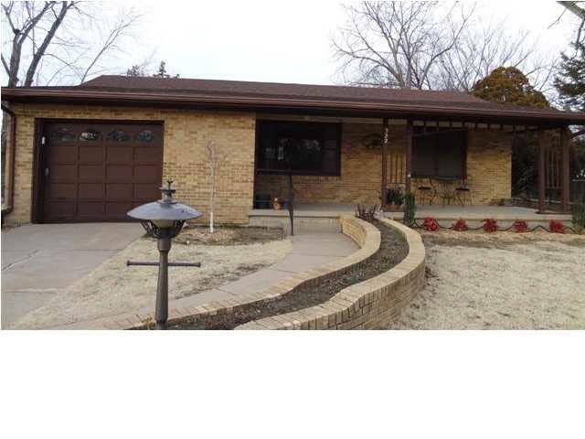 Classic ranch all brick exterior with nice curb ap
