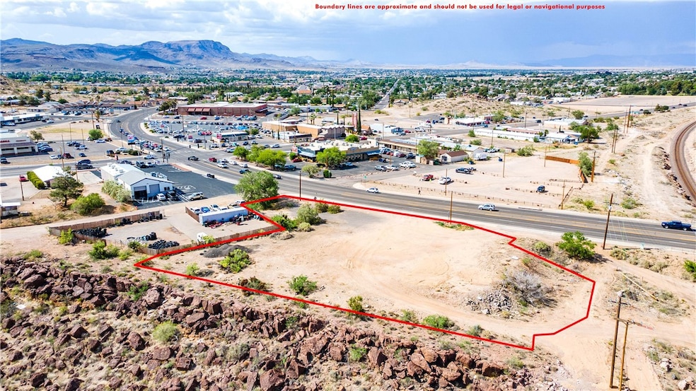 Aerial view of property and surrounding area with