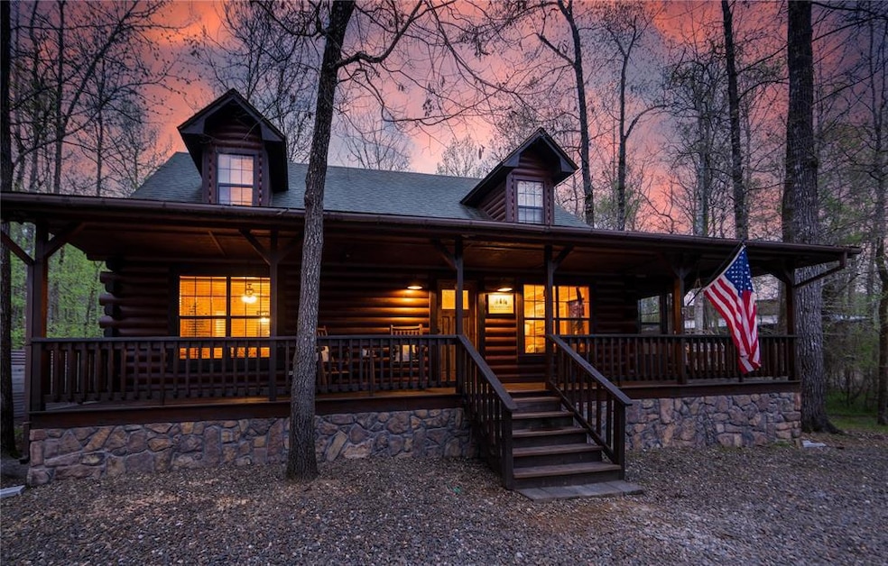 Log home with covered porch