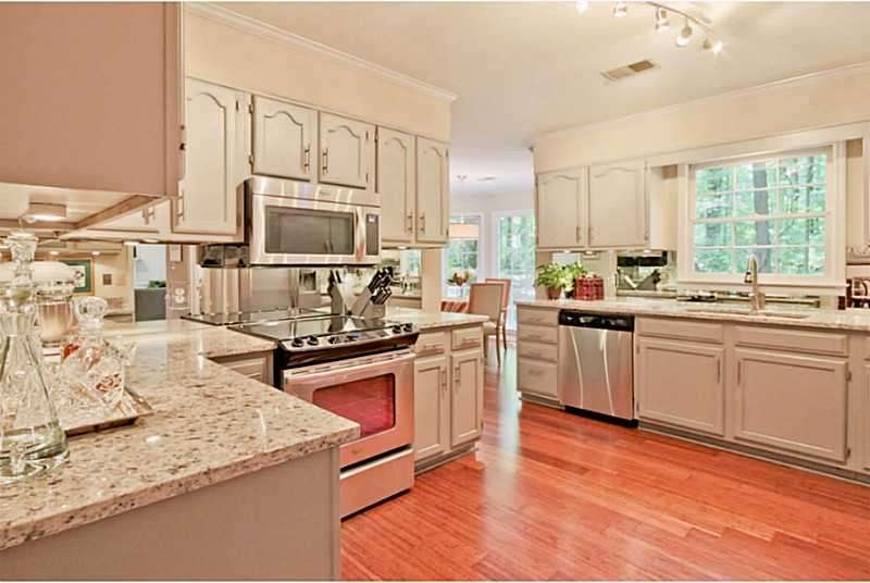Kitchen. New Granite, new bamboo flooring, glass b