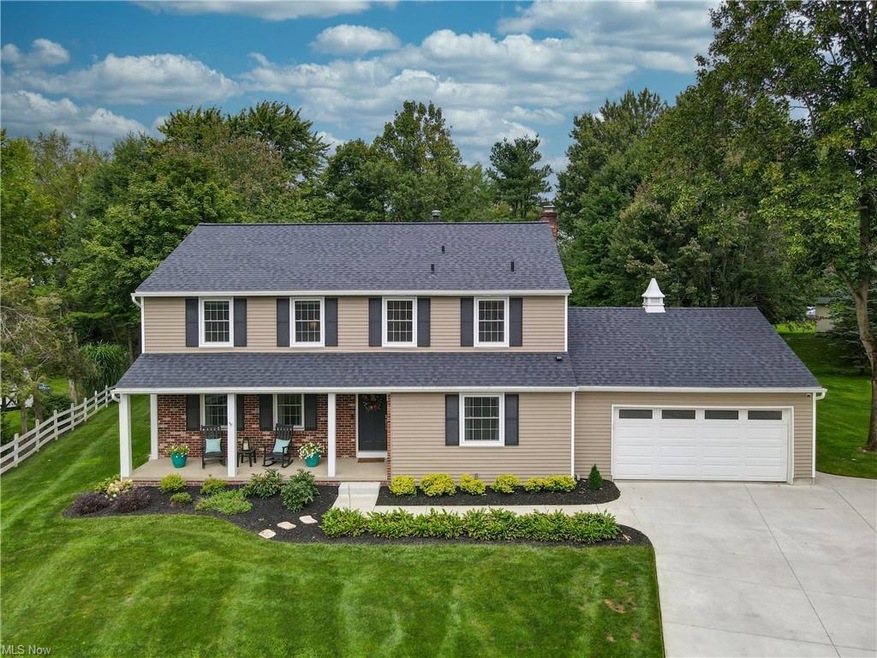 View of front of house featuring garage and a fron