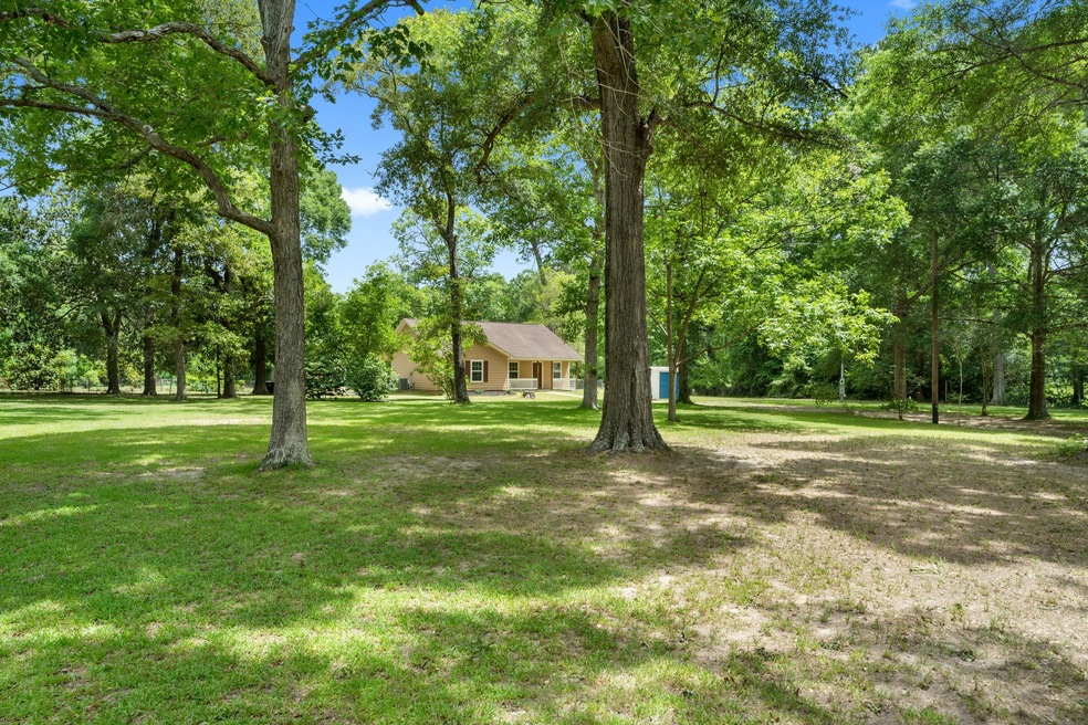 26251 Magnolia Dr, Splendora, TX 77372 - photo 1