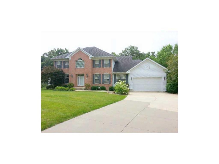 Front Exterior. An elegant home with a cul-de-sac 