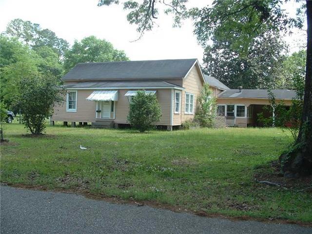 Facade/Exterior Front. Front View - Main Home