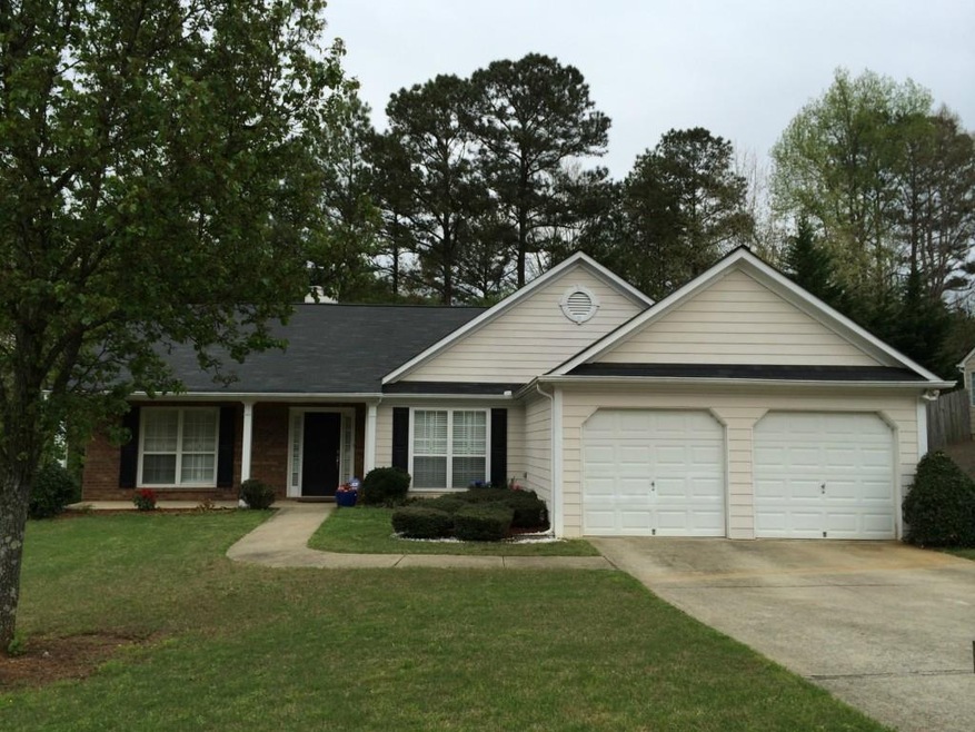 This stepless brick and hardi-plank sided ranch is