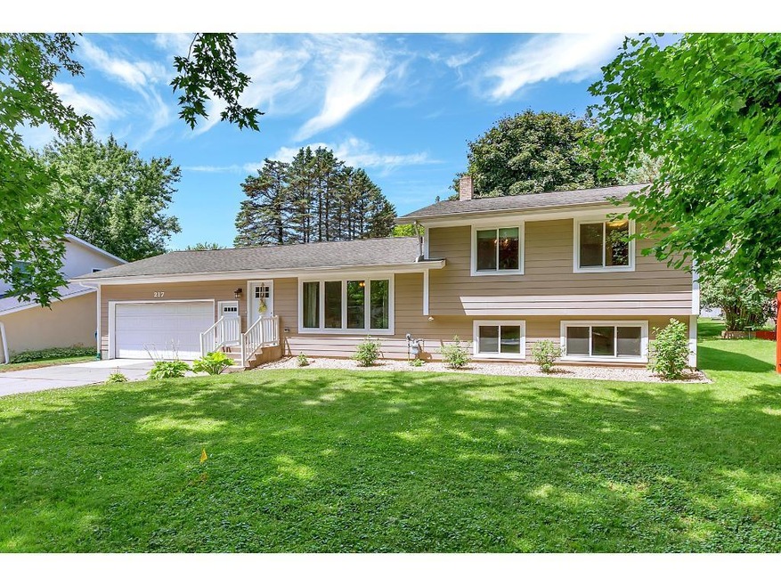 This attractive four level home is nestled in a pr