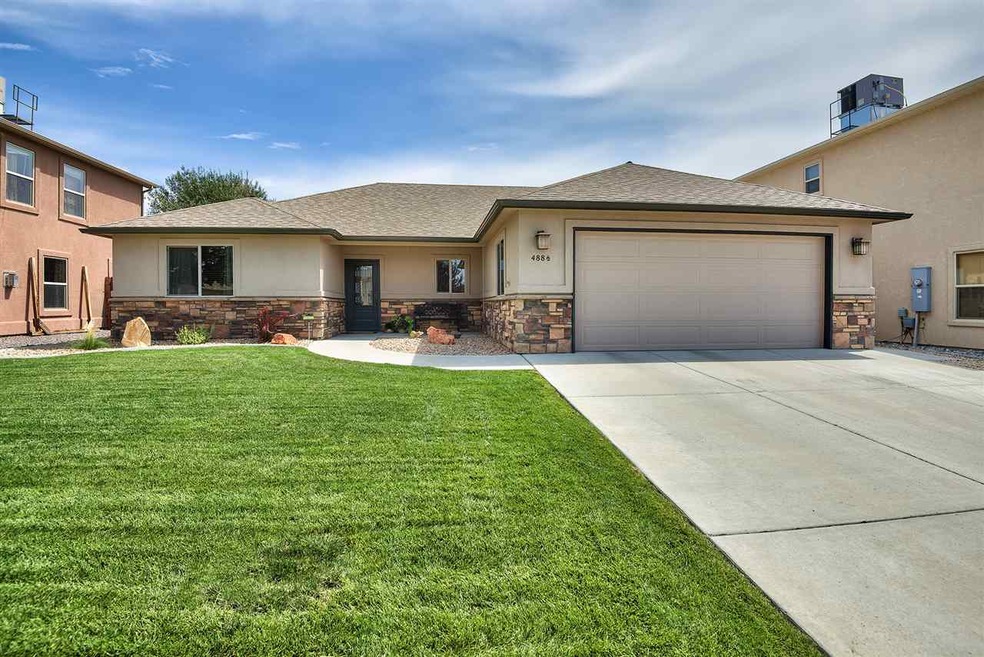 This gorgeous stucco & stone Southeast rancher wil