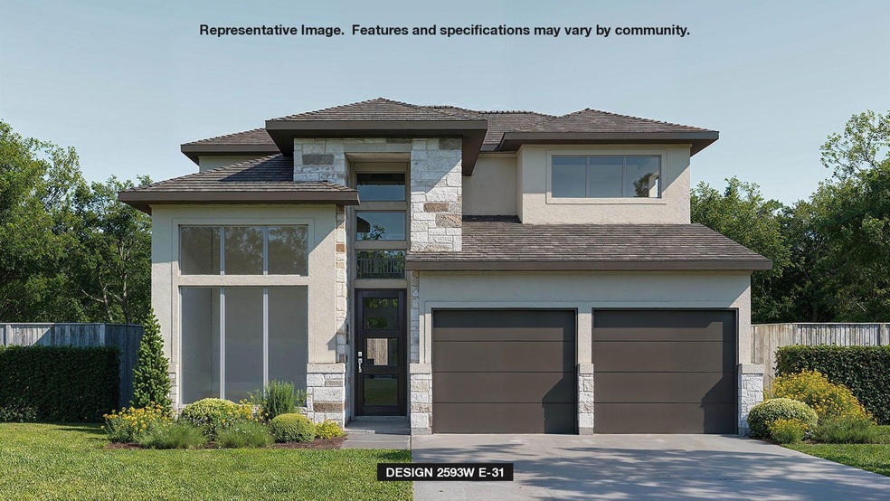 View of front of property featuring stone siding,