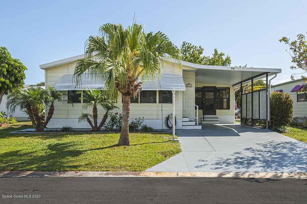 714 Amaryllis Dr, Barefoot Bay, FL 32976